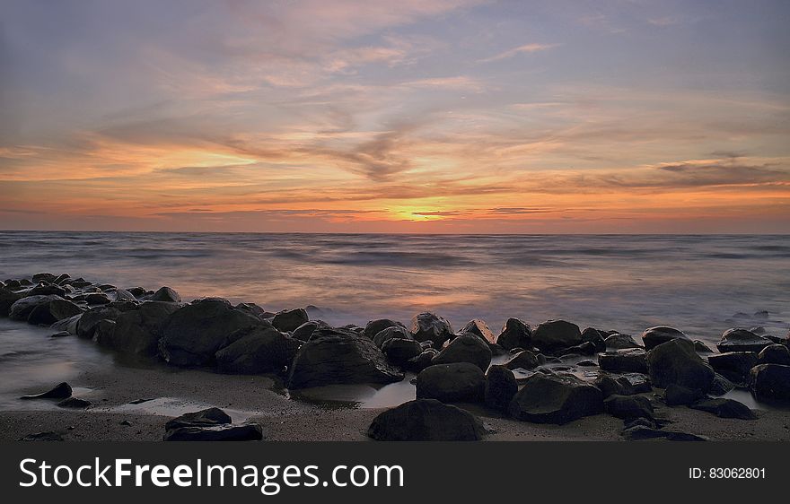 Sunset View By The Sea Shore