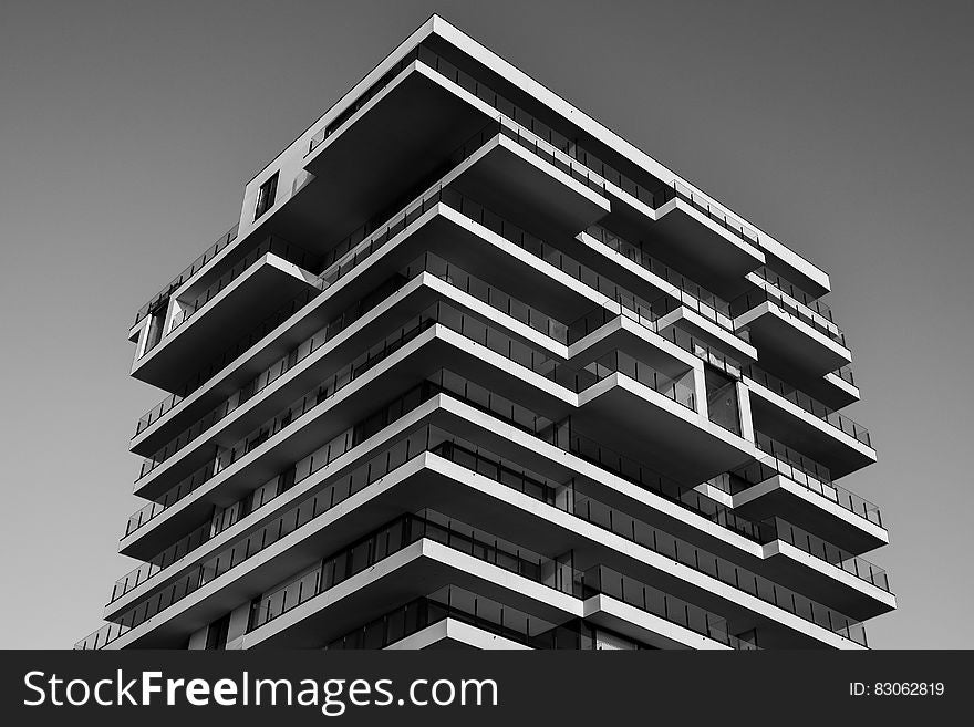 Grayscale Photo Of Concrete Building