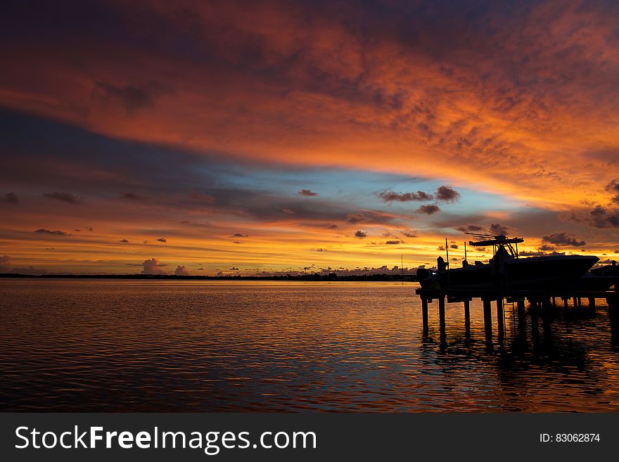 Sea Dock At Sunset