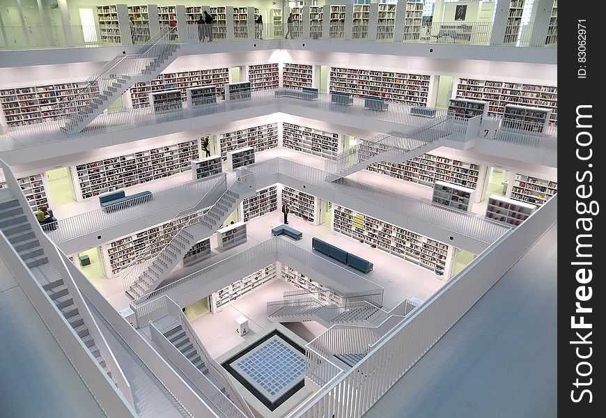 White Concrete Tall Building With Books