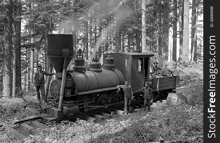 Greyscale Photography of 3 Person Beside Train on Forest