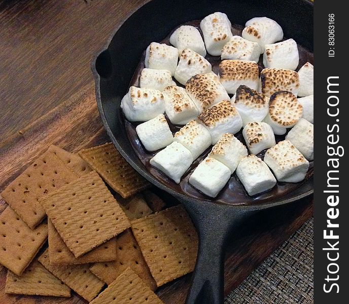 Fried Marshmallows on Top of Black Steel Nonstick Frying Pan