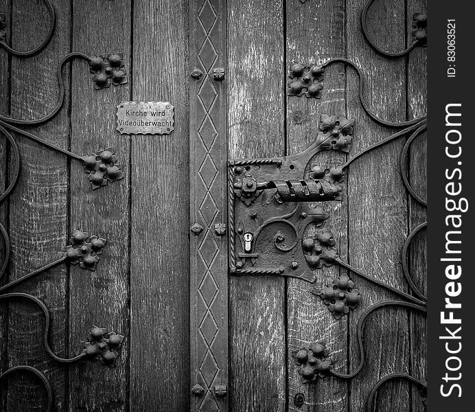Wooden Door in Grayscale Photography