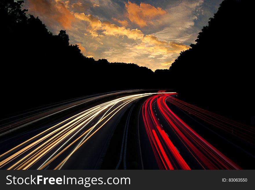 Timelapse Photography of Road With White and Red Lights