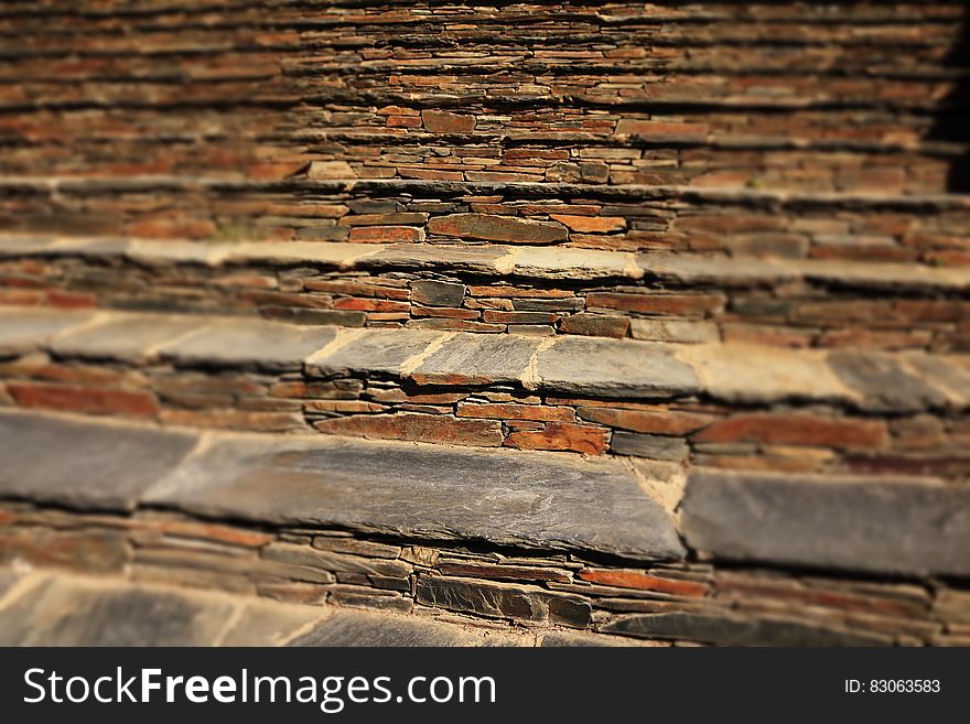 Close Up Photography of Brown and Grey File Concrete Bricks