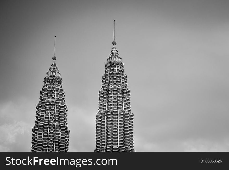 Gray Scale Photo Of 2 High Rise Building