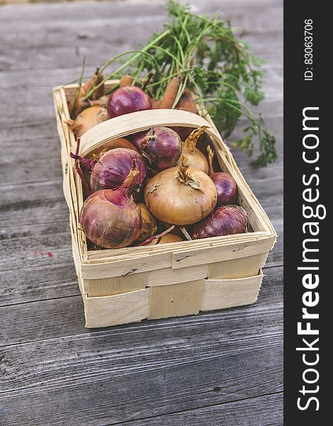 Red Onion On Rectangular Basket