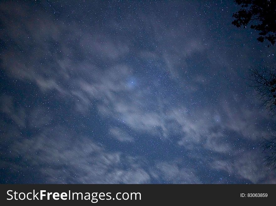 Scenic view starry night sky with cloudscape. Scenic view starry night sky with cloudscape.