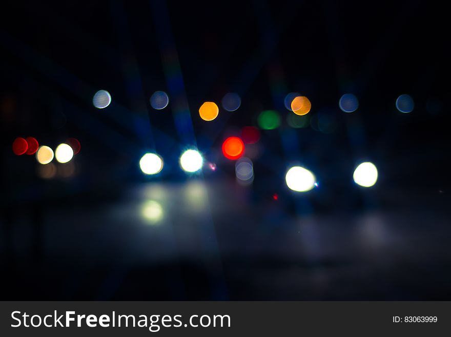 Photo of Car and Street Lights during Night Ime