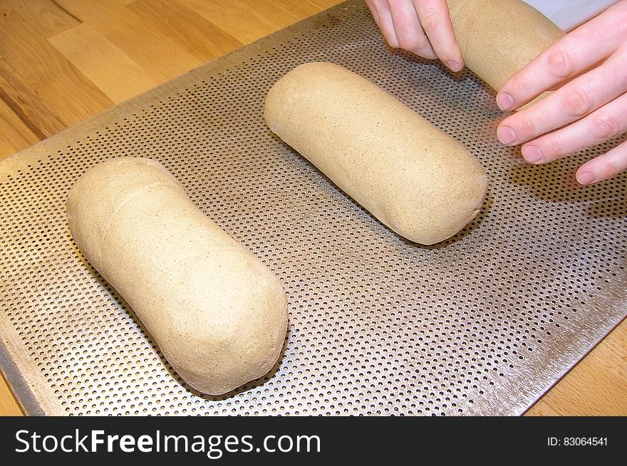 Person Making Brown Bread