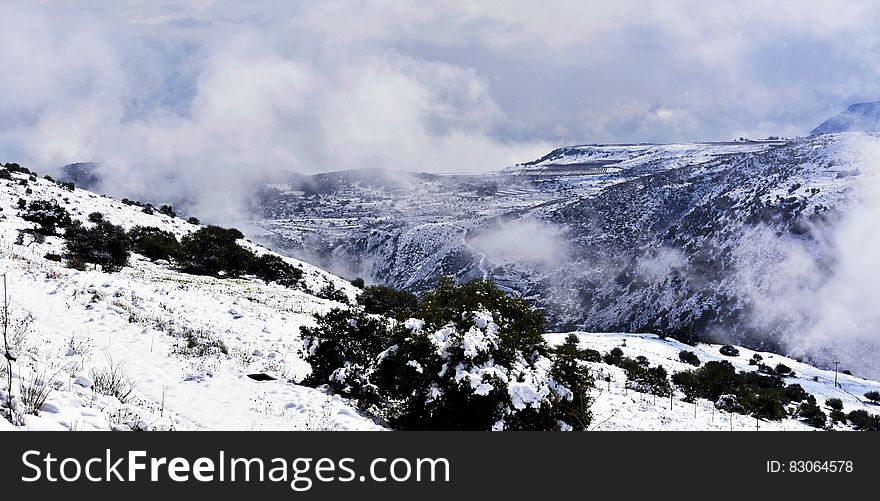 Fog over mountain peaks