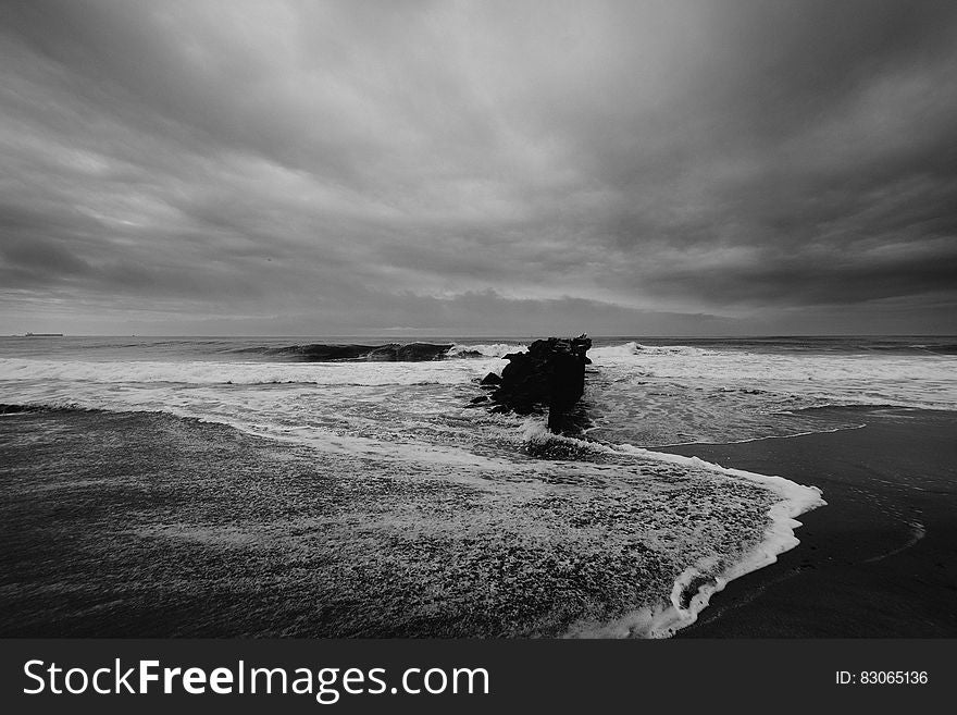 Black and white stormy beach.
