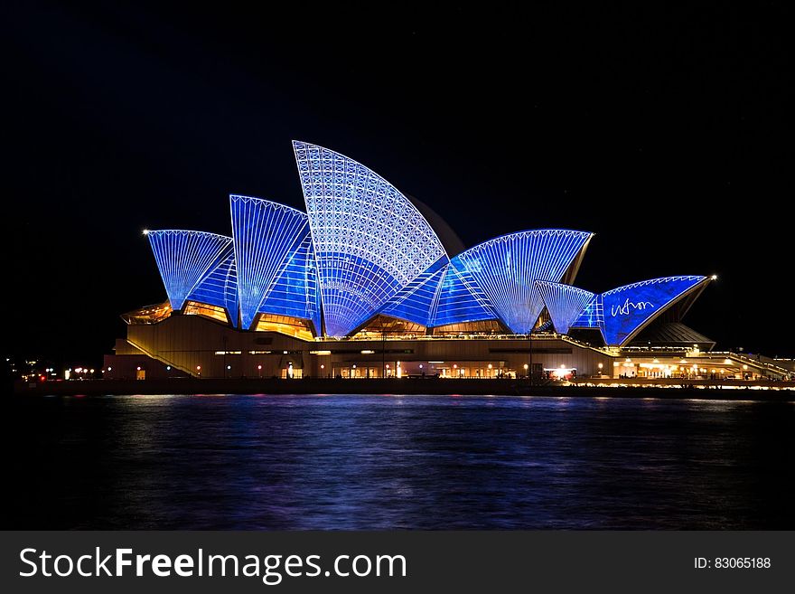 Blue Lighted Sydney Opera House during Nighttime