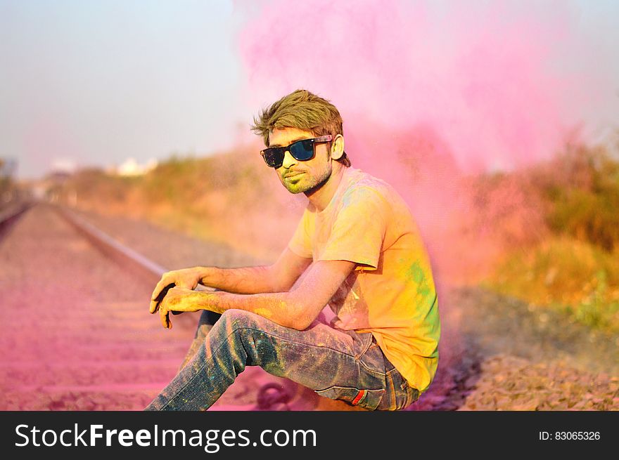 Man in T-Shirt and Jeans and Sunglasses Color Power