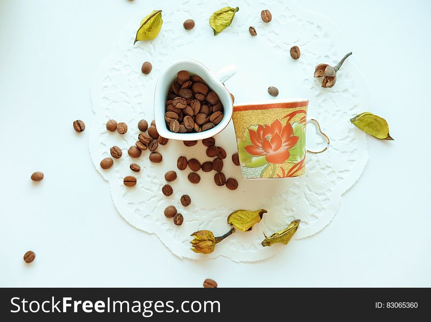 Brown Coffee Beans on White Ceramic Container