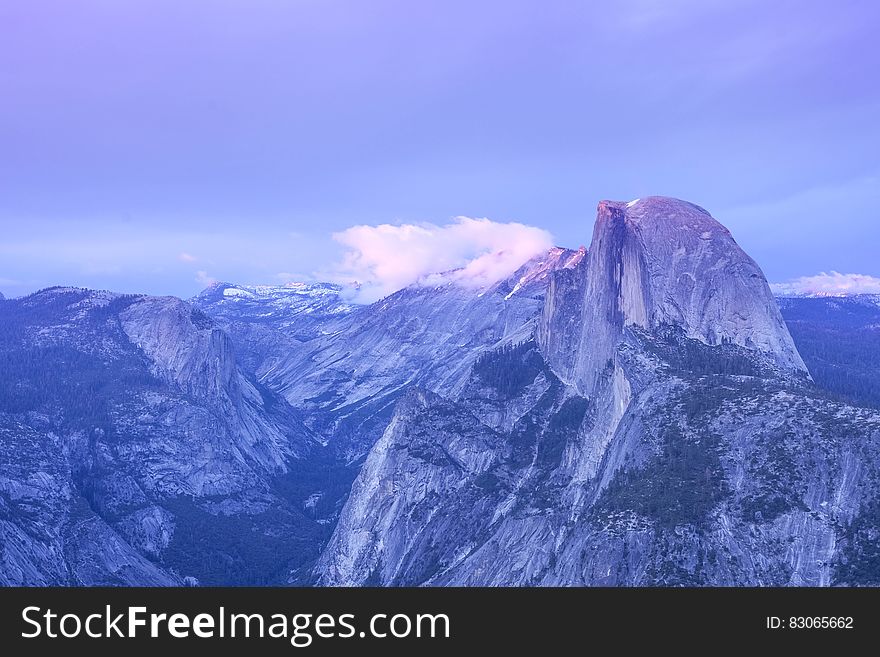 Mountains Under Cloudy Sky