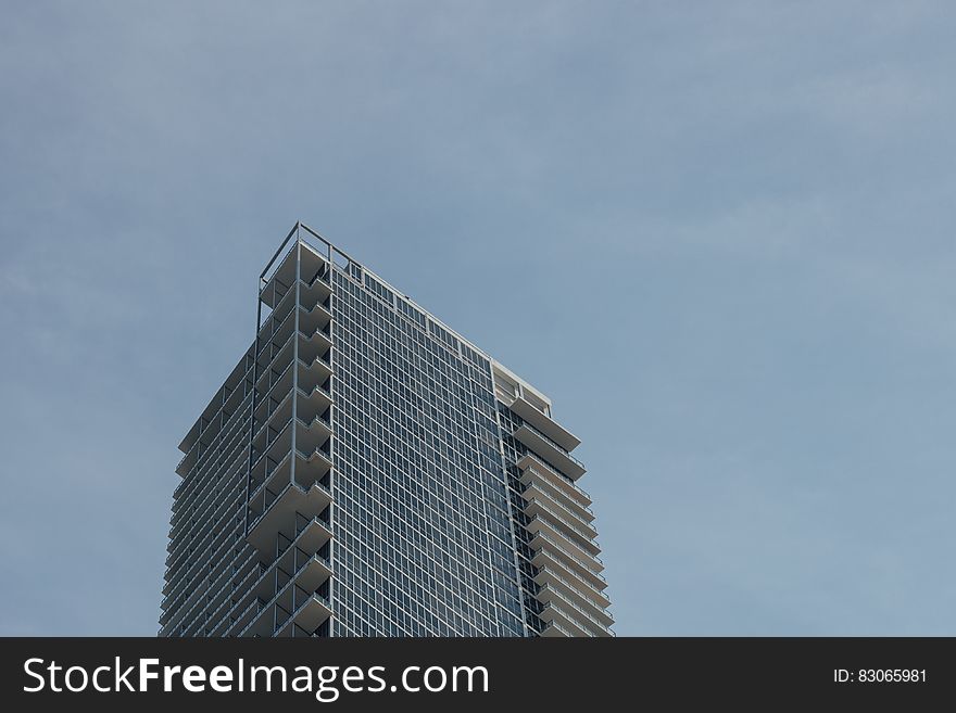 Low Angle Photo of Tower Building during Cloudy Sky