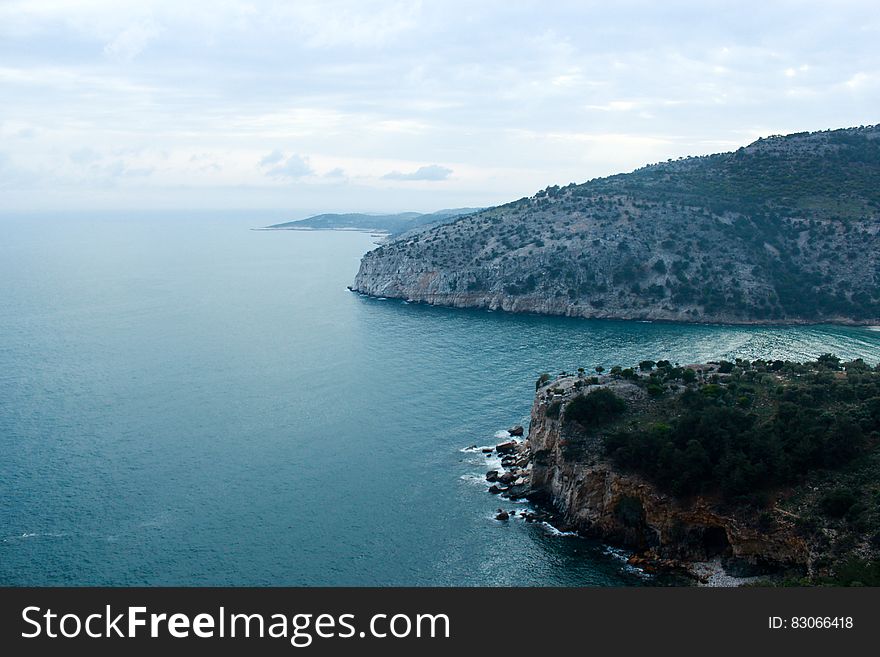 Aerial Photo Of Mountain And Sea