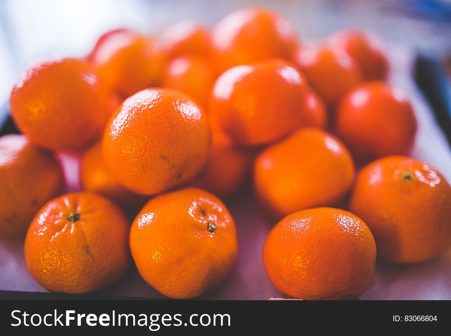 Shallow Focus Photography Of Orange Fruits