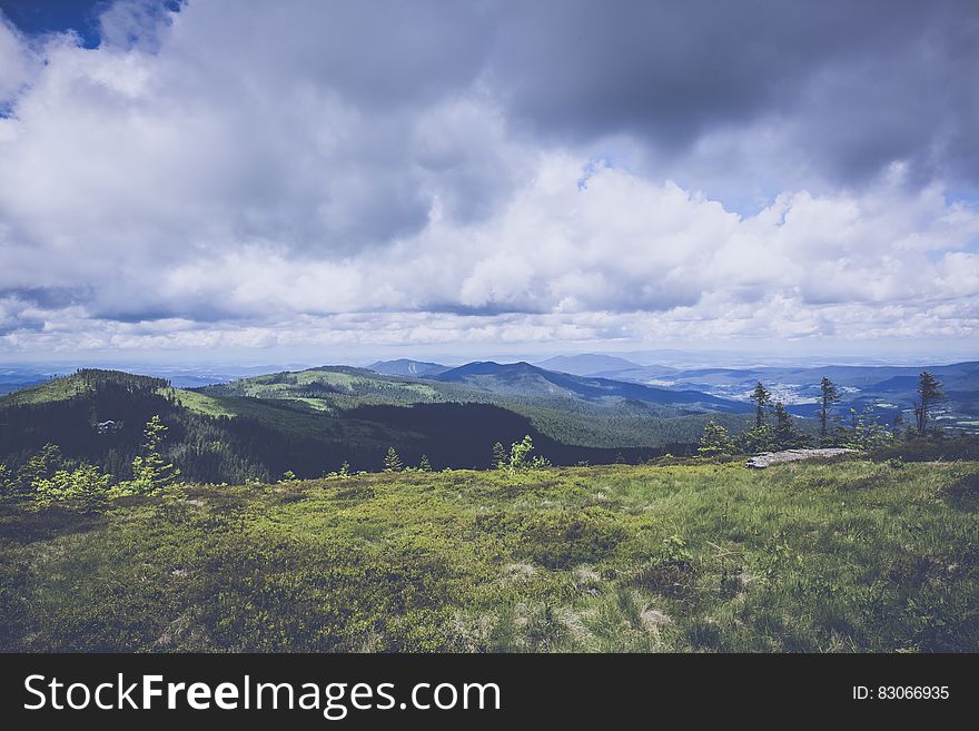 Green Mountain Under Blue Sky