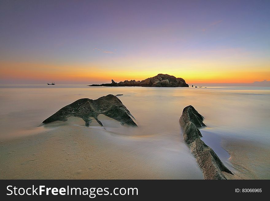Photo of an Island during Sunset