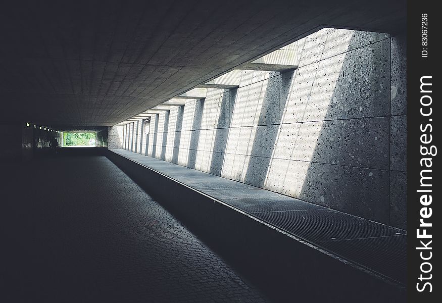 Sunlight Streaming Through Concrete Opening Of Underground Passageway