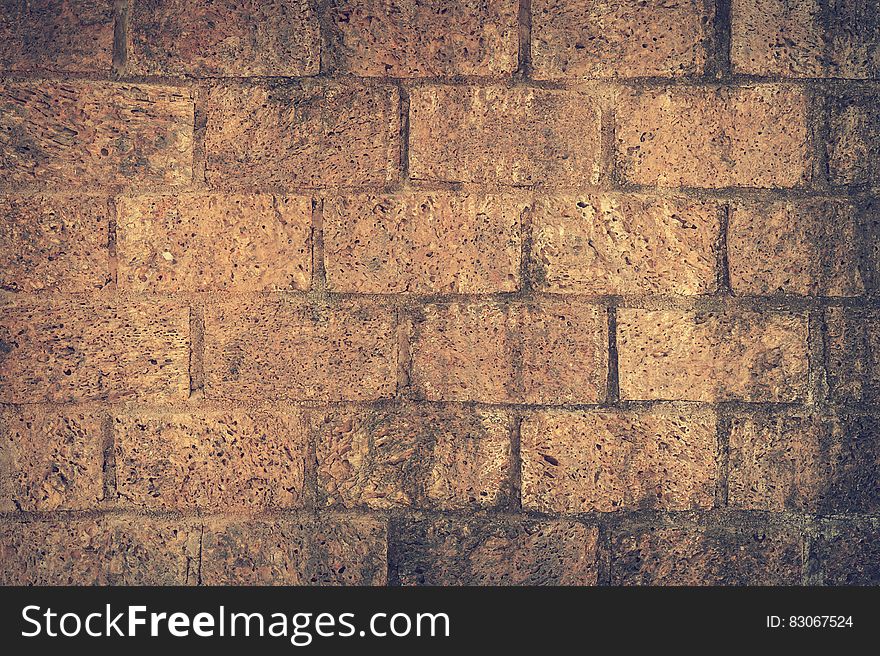 Brown and Black Brick Wall Close Up Shot Photography