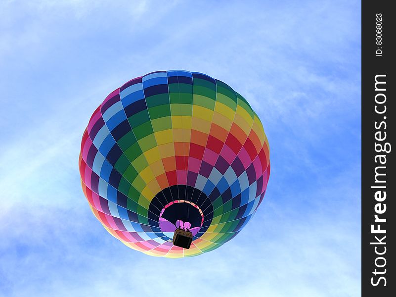 Hot Air Balloon Flying Under Blue Sky during Daytime
