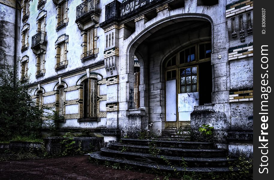 White Abandon Condominium during Day Time