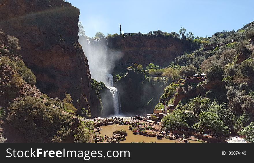 Waterfall Near Green Trees During Daytime