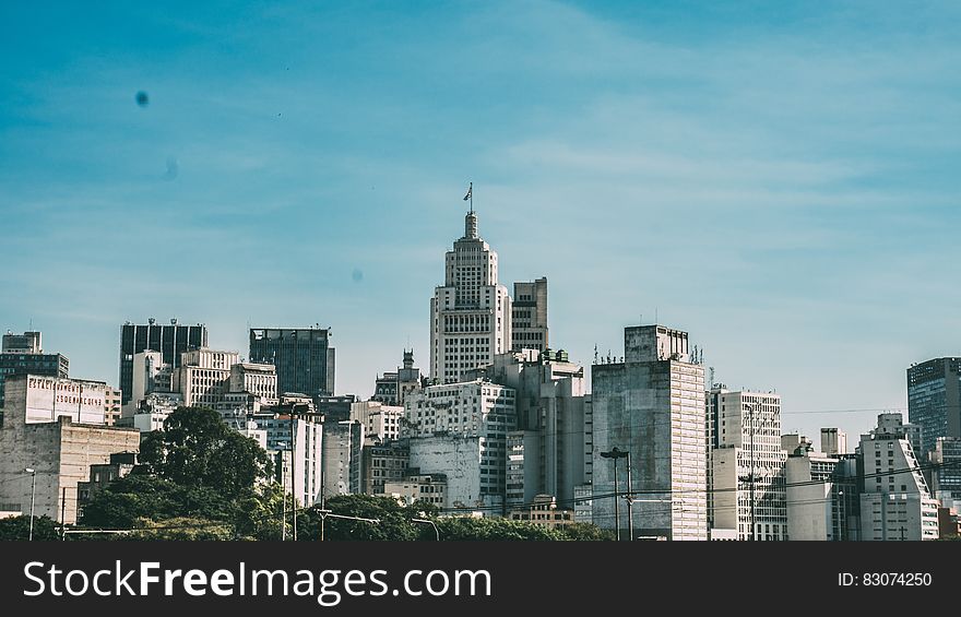 City Under Blue Cloudy Sky During Daytime