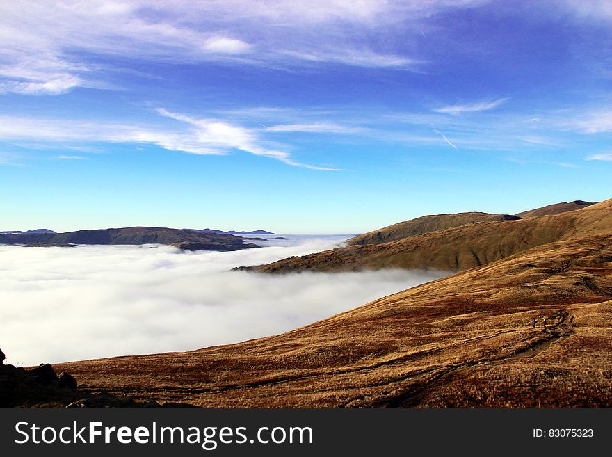 Clouds over mountain valley