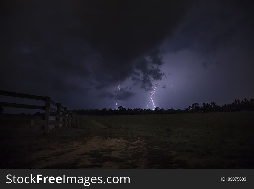 Lightning Strike The Ground During Night Time