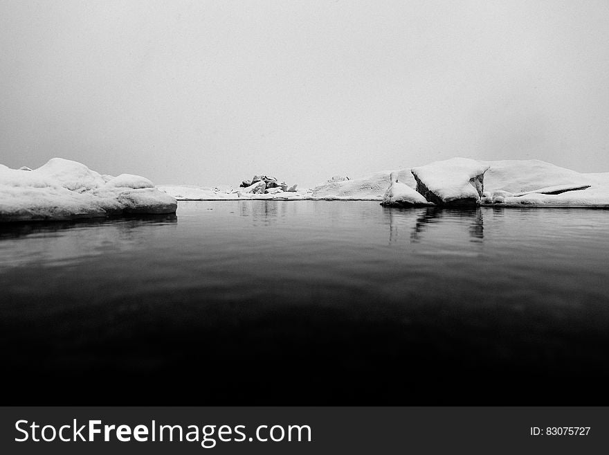 A black and white image of an ice lake.