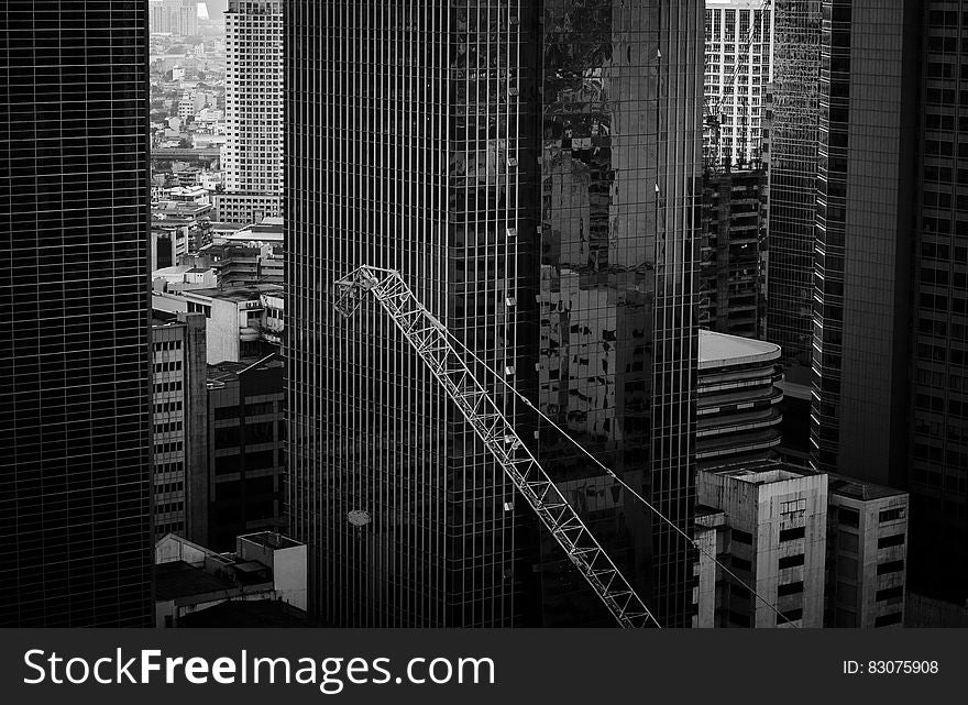 Grayscale Photo Of A High Rise Building