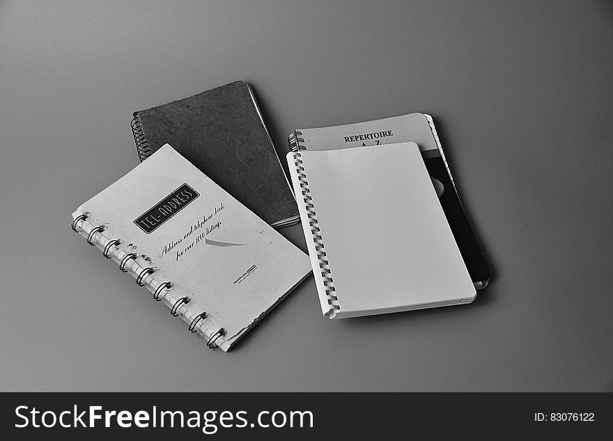 White Notebook on White and Black Book