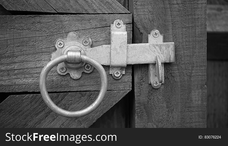 Grayscale Photo Of Door Knock