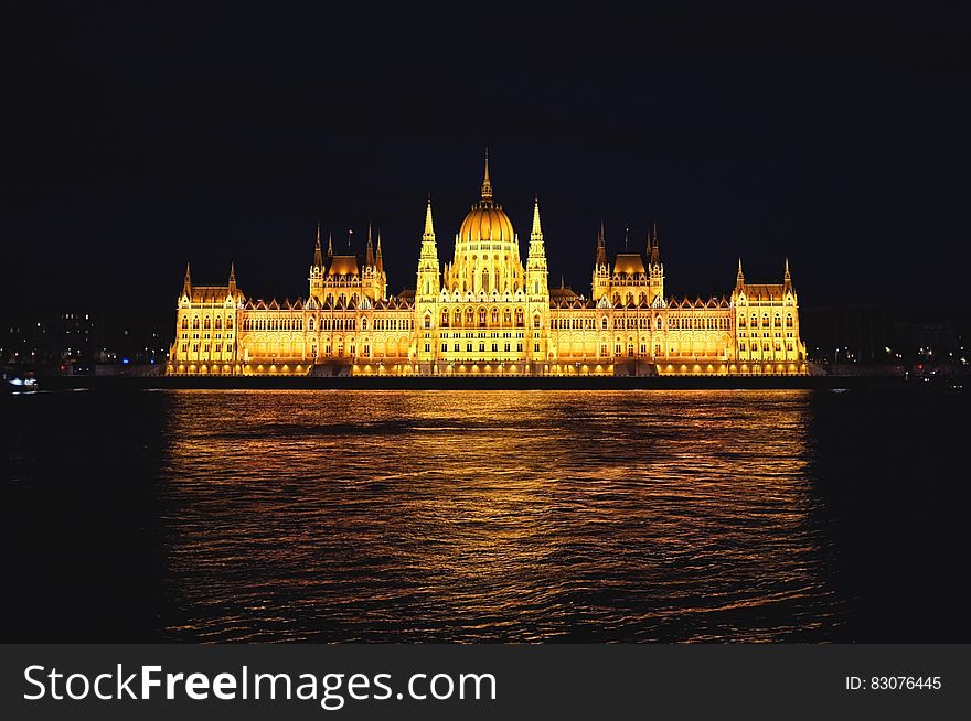 Hungarian Parliament Building with lights at night.