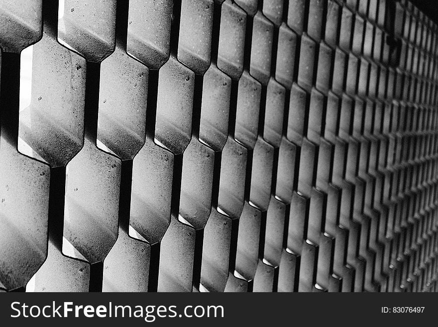 A background of corrugated metal sheets.