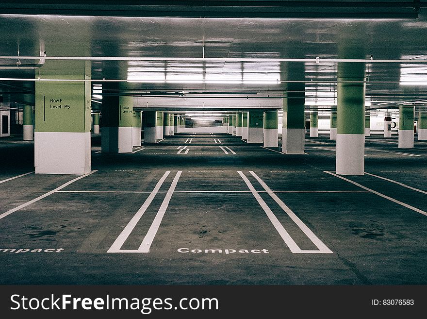 Interior view of empty modern multi-story car park.