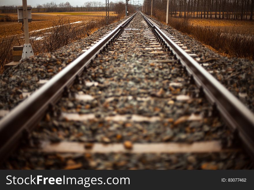 A close up of a railroad track. A close up of a railroad track.