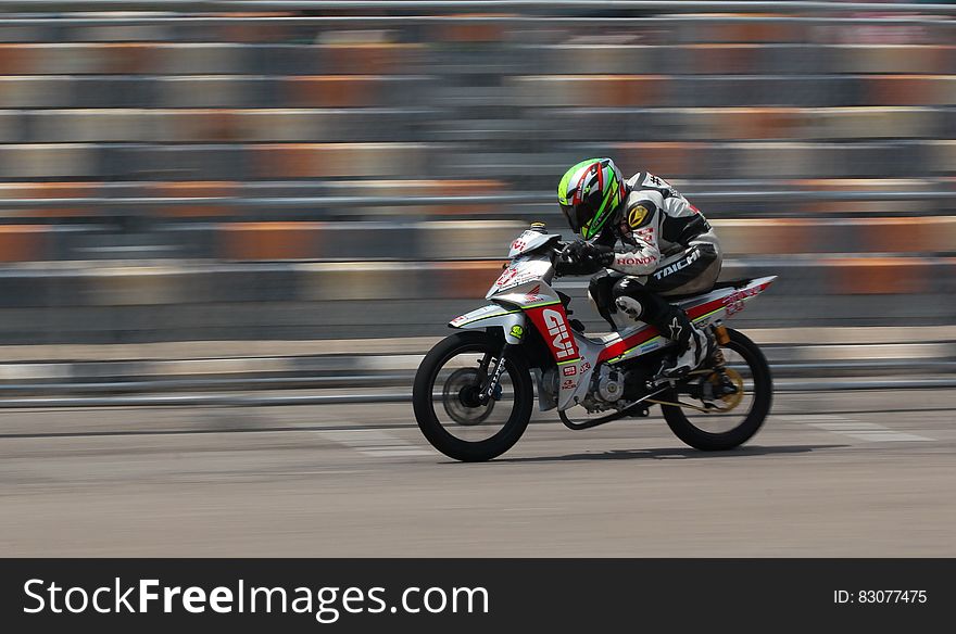 Motorcycle Racer on Silver Motorcycle