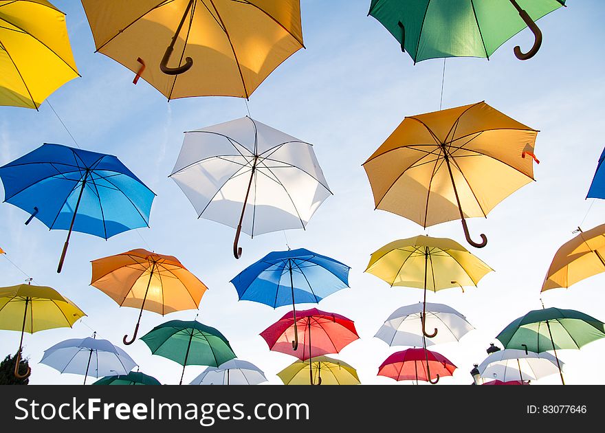 3d artistic illustration of colorful opened umbrellas flying in sky. 3d artistic illustration of colorful opened umbrellas flying in sky.