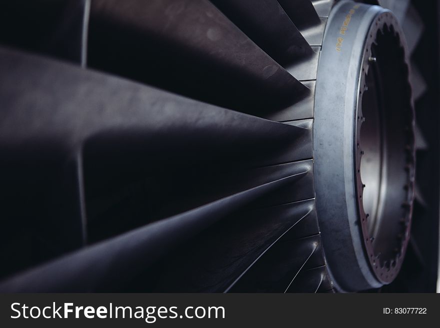 A close up shot of an airplane engine turbine.