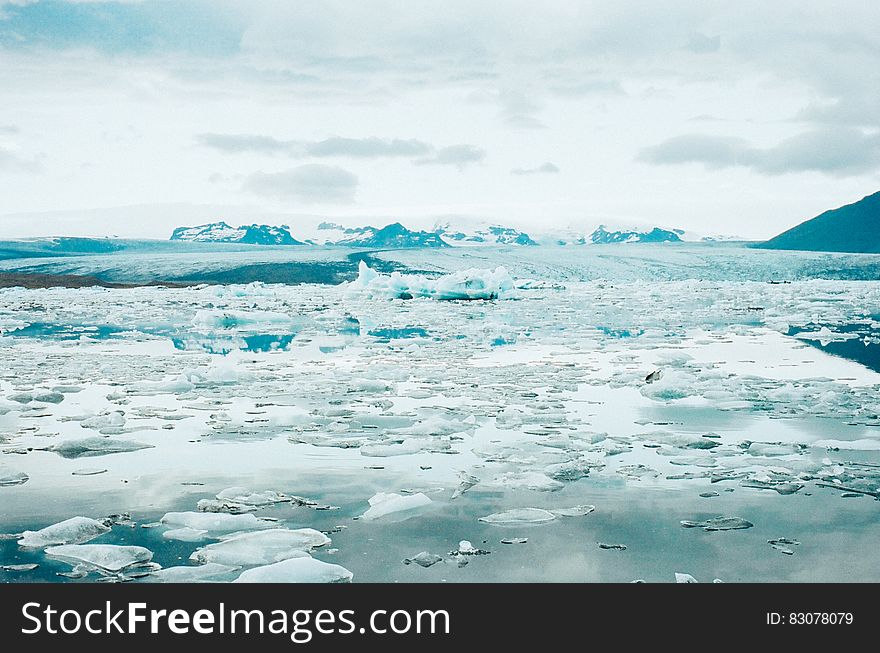 Scenic view of thawing glacier and lagoon, Iceland. Scenic view of thawing glacier and lagoon, Iceland.