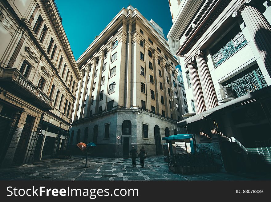 A building in a city shot from a below angle. A building in a city shot from a below angle.