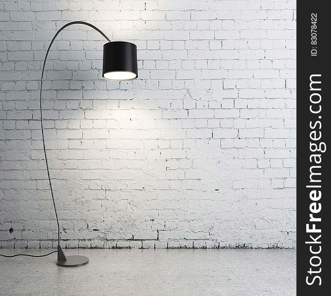 Turned on Black Torchiere Lamp