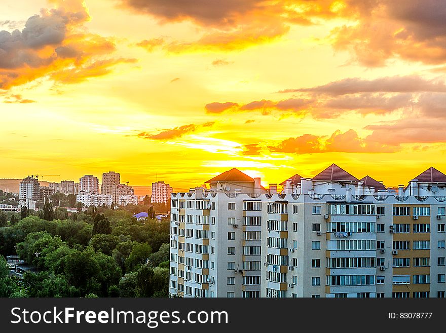 Gray White High Rise Building during Sun Set