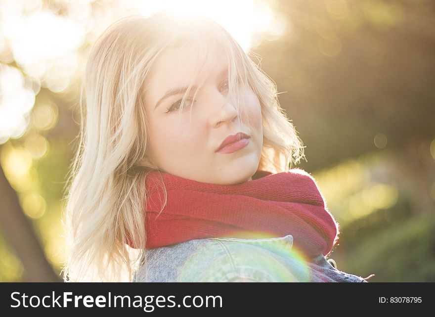 Young blond woman portrait with sun light coming from behind. Young blond woman portrait with sun light coming from behind