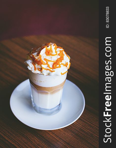 White and Brown Caramel Frappe on Clear Drinking Glass